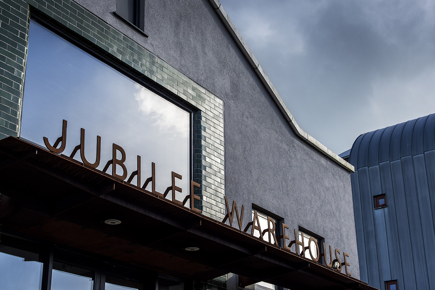 A view of the exterior of the Jubilee Wharf Warehouse in Penryn on a winters day