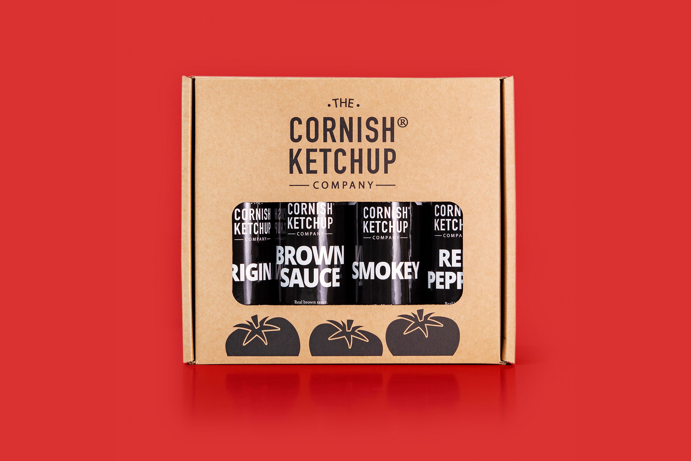 Cornish Ketchup gift pack with four bottles of ketchup on a red background