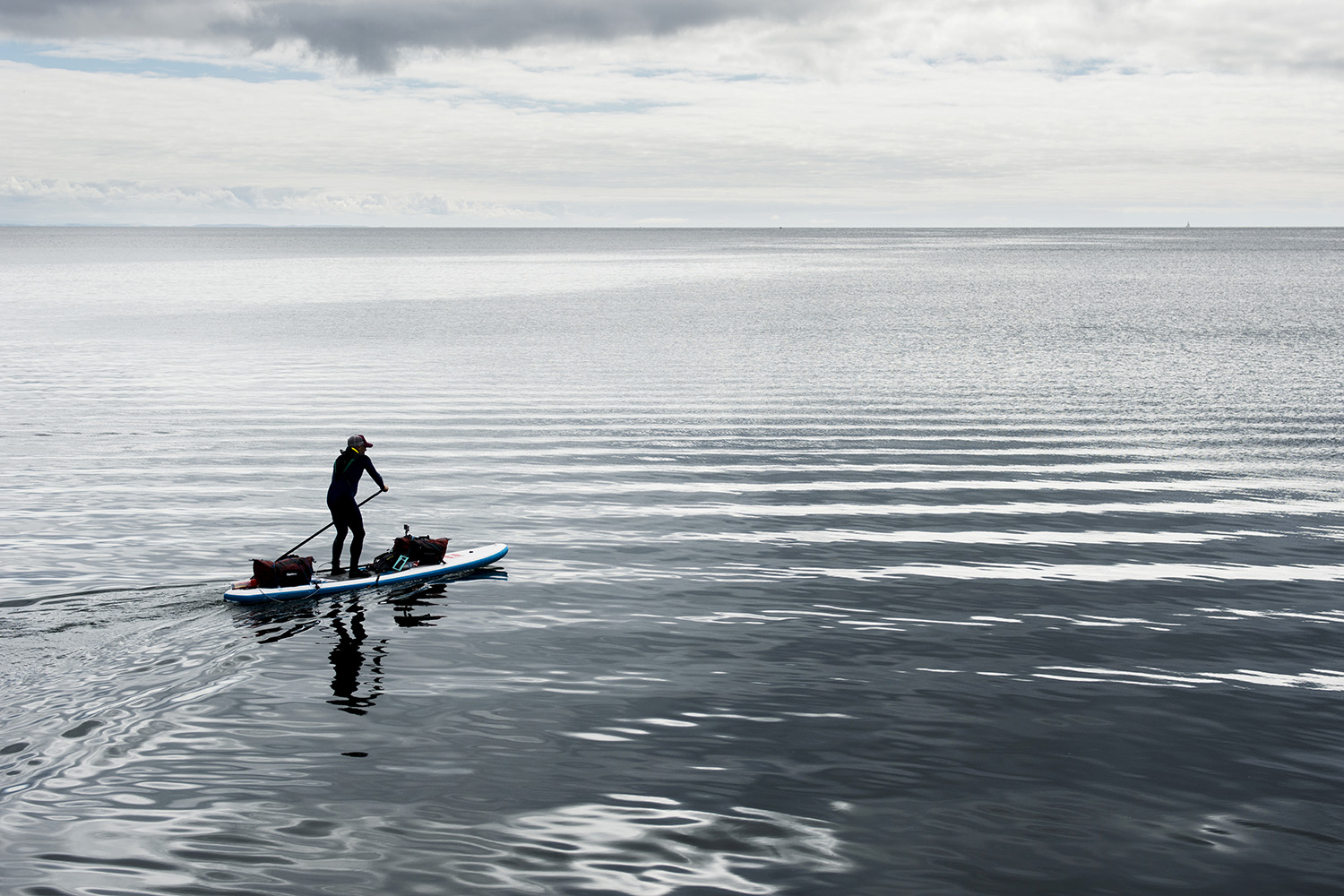 Matt Button paddle boarding 